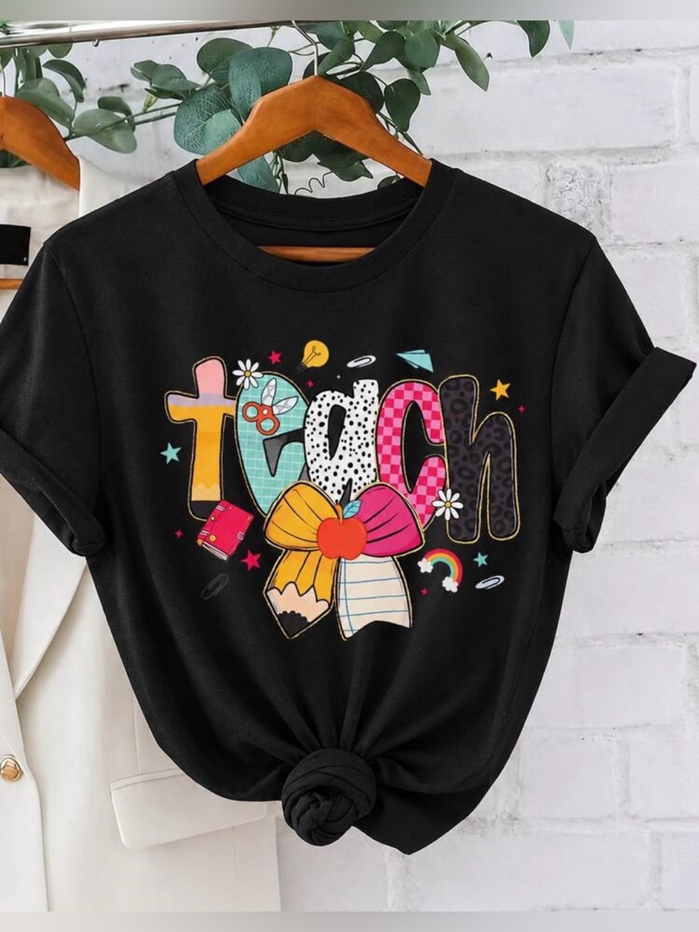 Women's Black Graphic 'Teach' Short Sleeve Tee with Colorful Bow